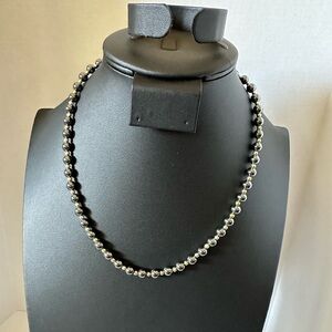 Metallic faux pearl beaded gold tone and gunmetal color necklace